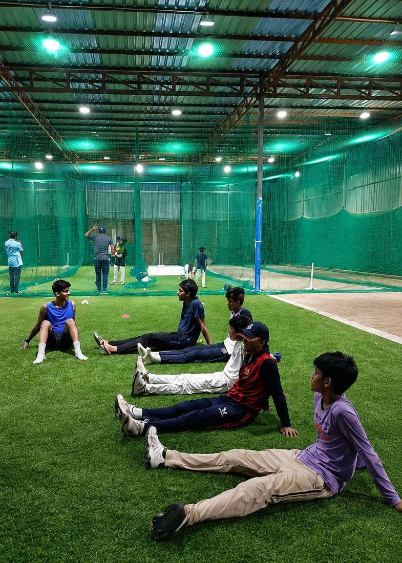 Players warming up together at Cricket Excellence Centre